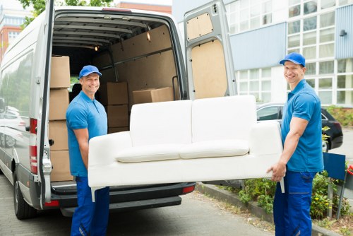Office relocation planning in Holland Park with business equipment and moving team