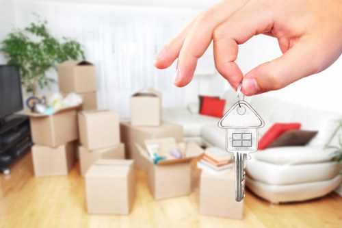 Removal van and moving boxes for a Holland Park home move