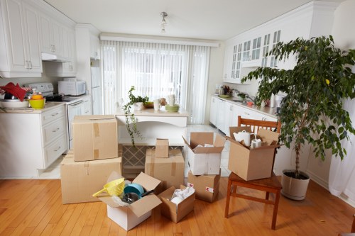 Packing and transporting office items for a move in Holland Park