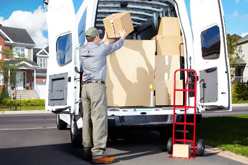 Local movers working around residential access in Holland Park