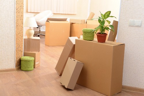 Loading furniture into a van for a Holland Park move